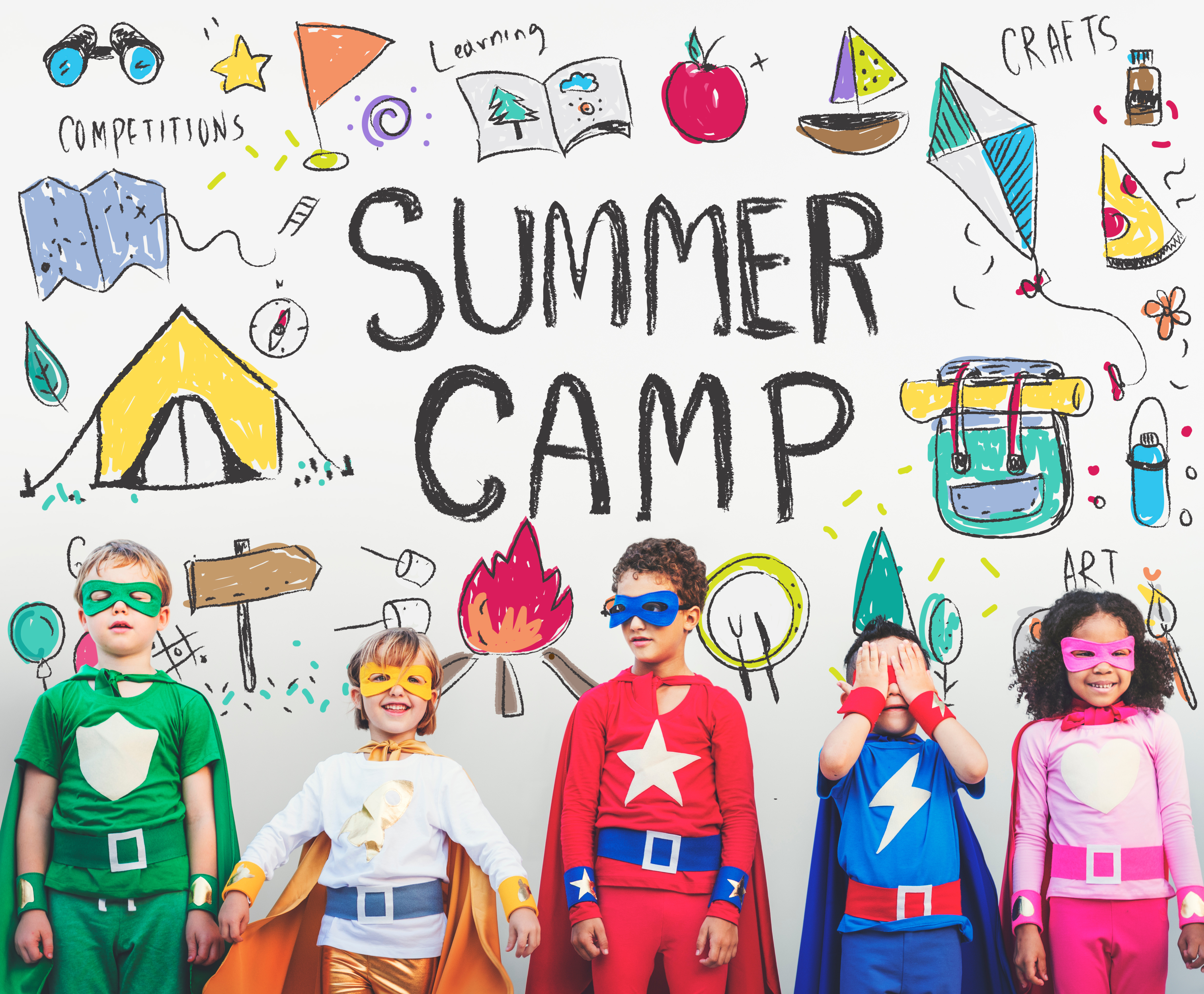 summer camp kids dressed as superheroes