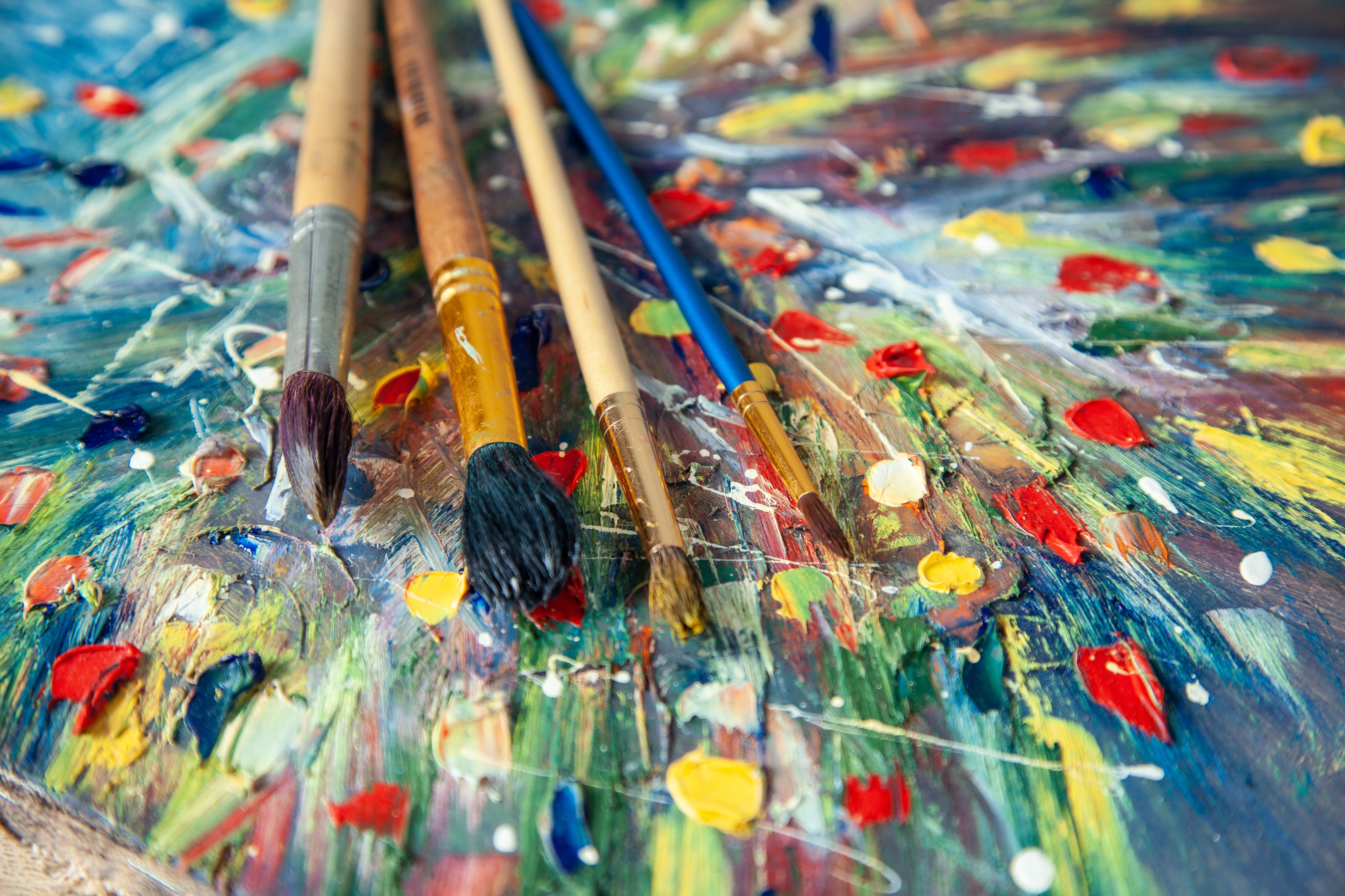 paint brushes with splattered paint