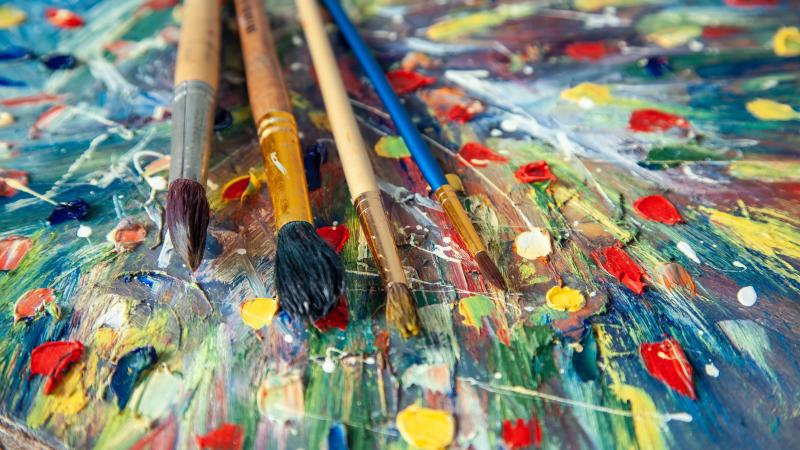 paint brushes with splattered paint